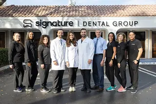The Signature Dental Group team outside the Delray Beach practice.