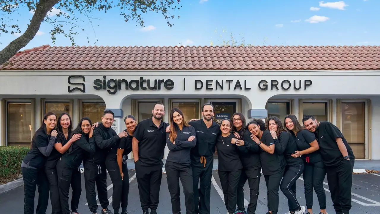 The Signature Dental Group team outside the practice at 160 SE 6th Ave, Ste B-1, Delray Beach, Florida.